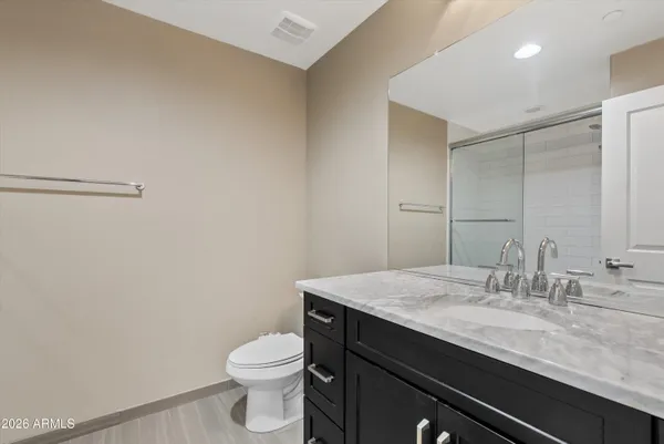 a bathroom with a bath tub and a shower