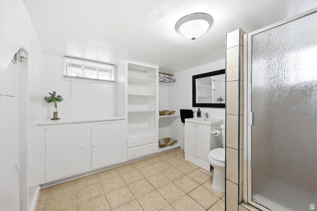 676 South 500 West Provo, UT 84601 - Photo 14 of 29 Full bathroom with vanity, a shower stall, and light tile patterned flooring