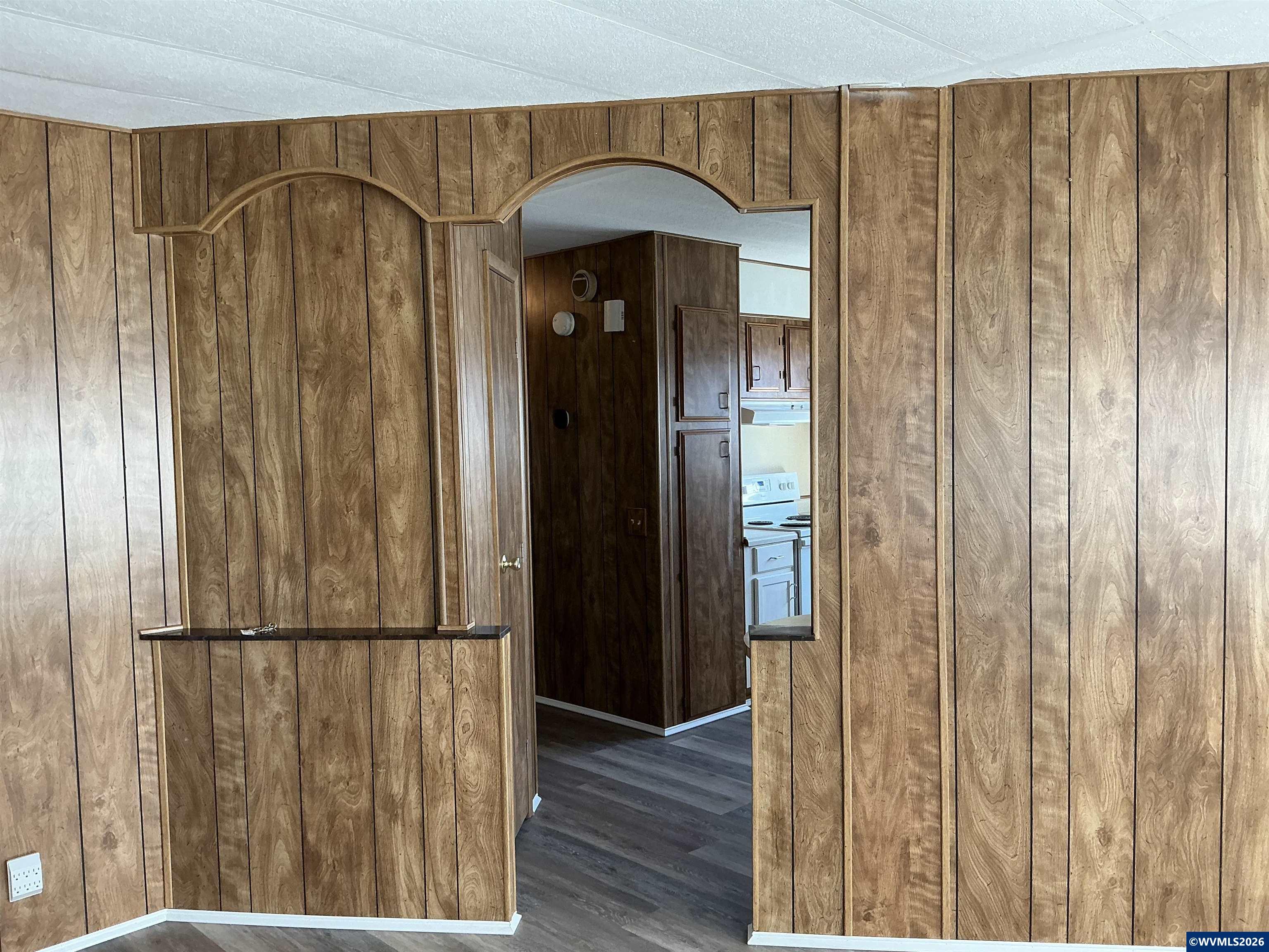 5422 Portland Road Northeast, Unit 67 Salem, OR 97305 - Photo 23 of 45 a view of entrance with wooden floor