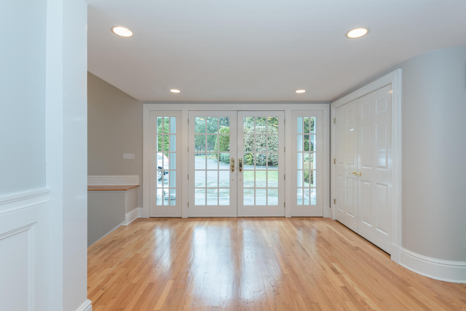 783 Valley Road New Canaan, CT 06840 - Photo 3 of 23 a view of an empty room with wooden floor and a window