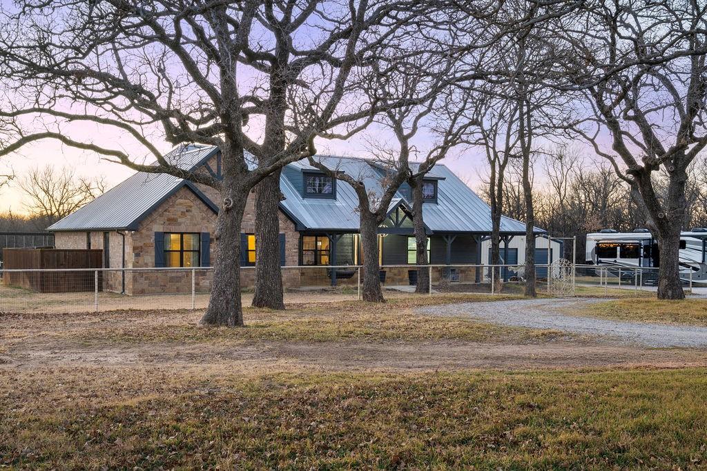 4069 Farm To Market Road 730 North Decatur, TX 76234 - Photo 2 of 33 a house that has a tree in front of it