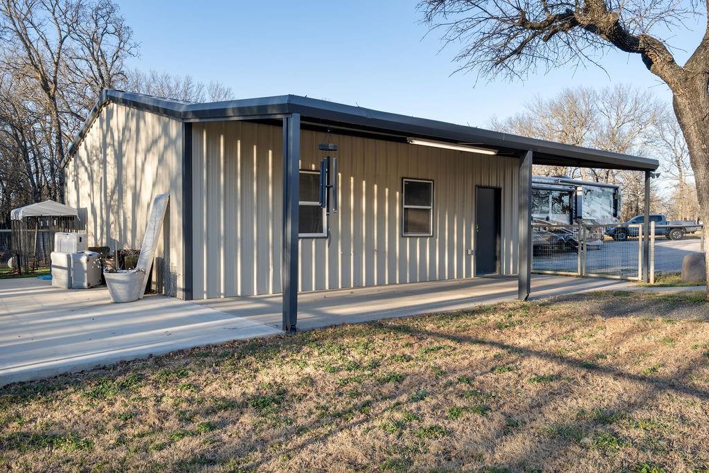 4069 Farm To Market Road 730 North Decatur, TX 76234 - Photo 27 of 33 a view of a house with a small yard and wooden floor and fence