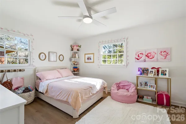 a bedroom with a bed and closet