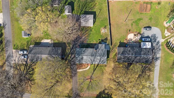 a aerial view of a house with swimming pool