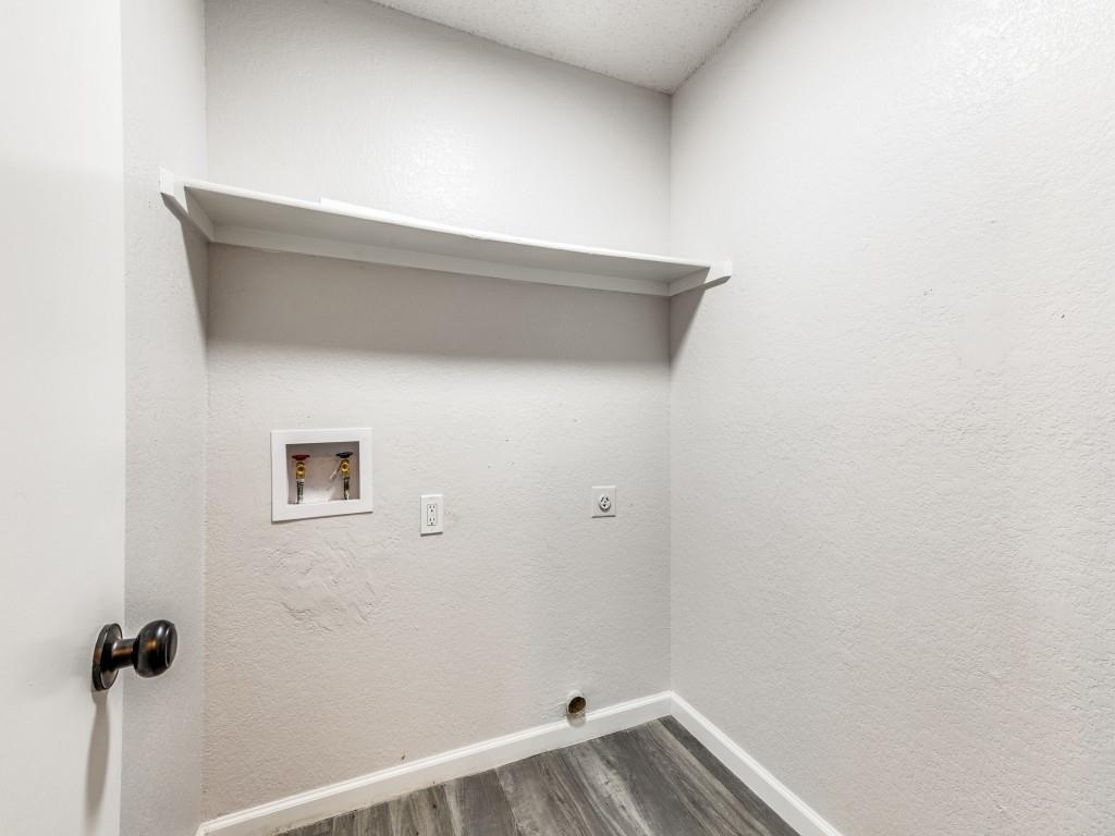 7457 Tiffany Meadows Lane Fort Worth, TX 76140 - Photo 13 of 18 a view of small space with racks on the wall