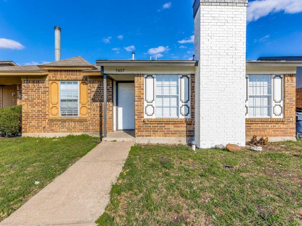 7457 Tiffany Meadows Lane Fort Worth, TX 76140 - Photo 3 of 18 a front view of a house with a yard
