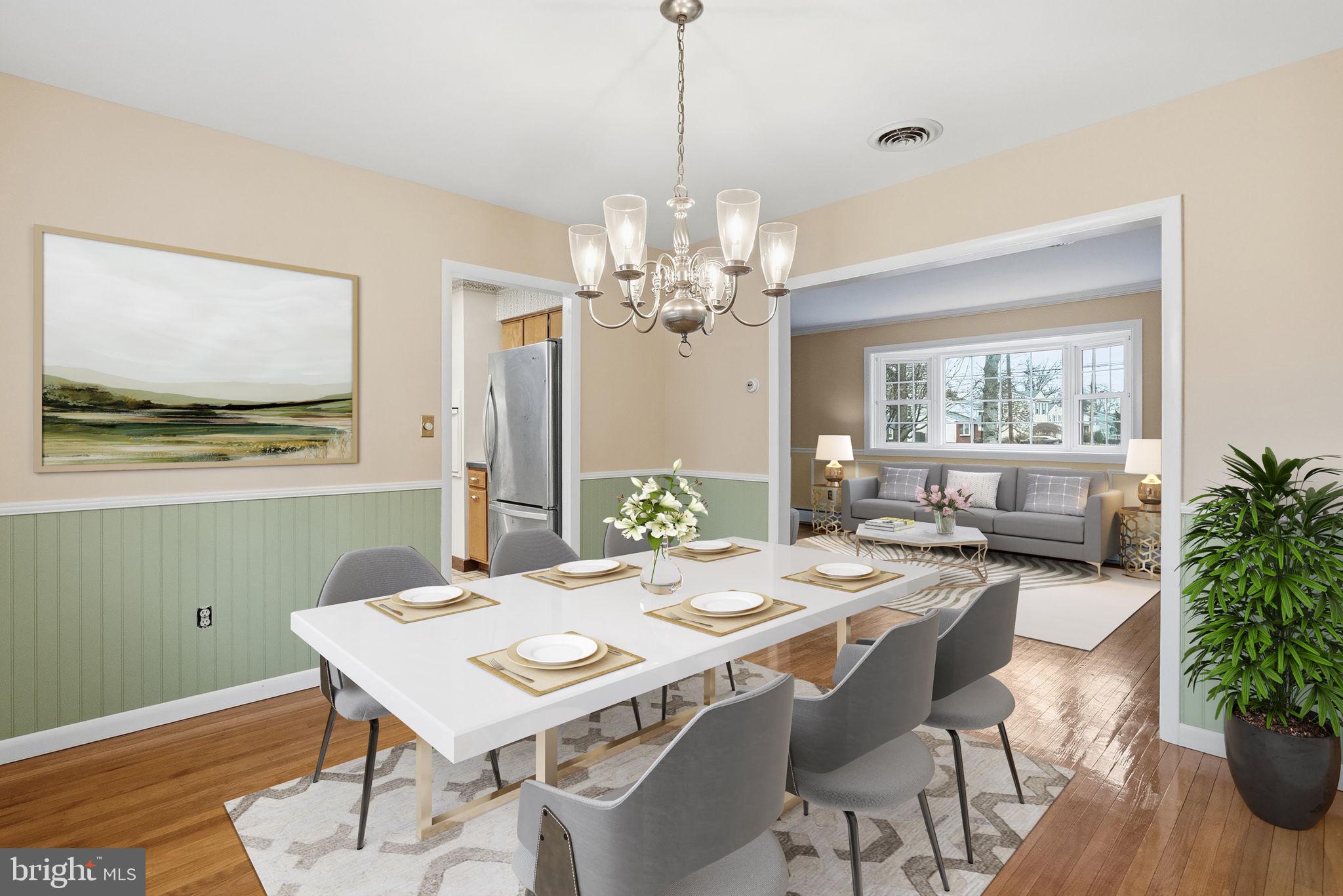 416 Oak Park Road Hatfield, PA 19440 - Photo 13 of 39 a view of a dining room with furniture window and wooden floor