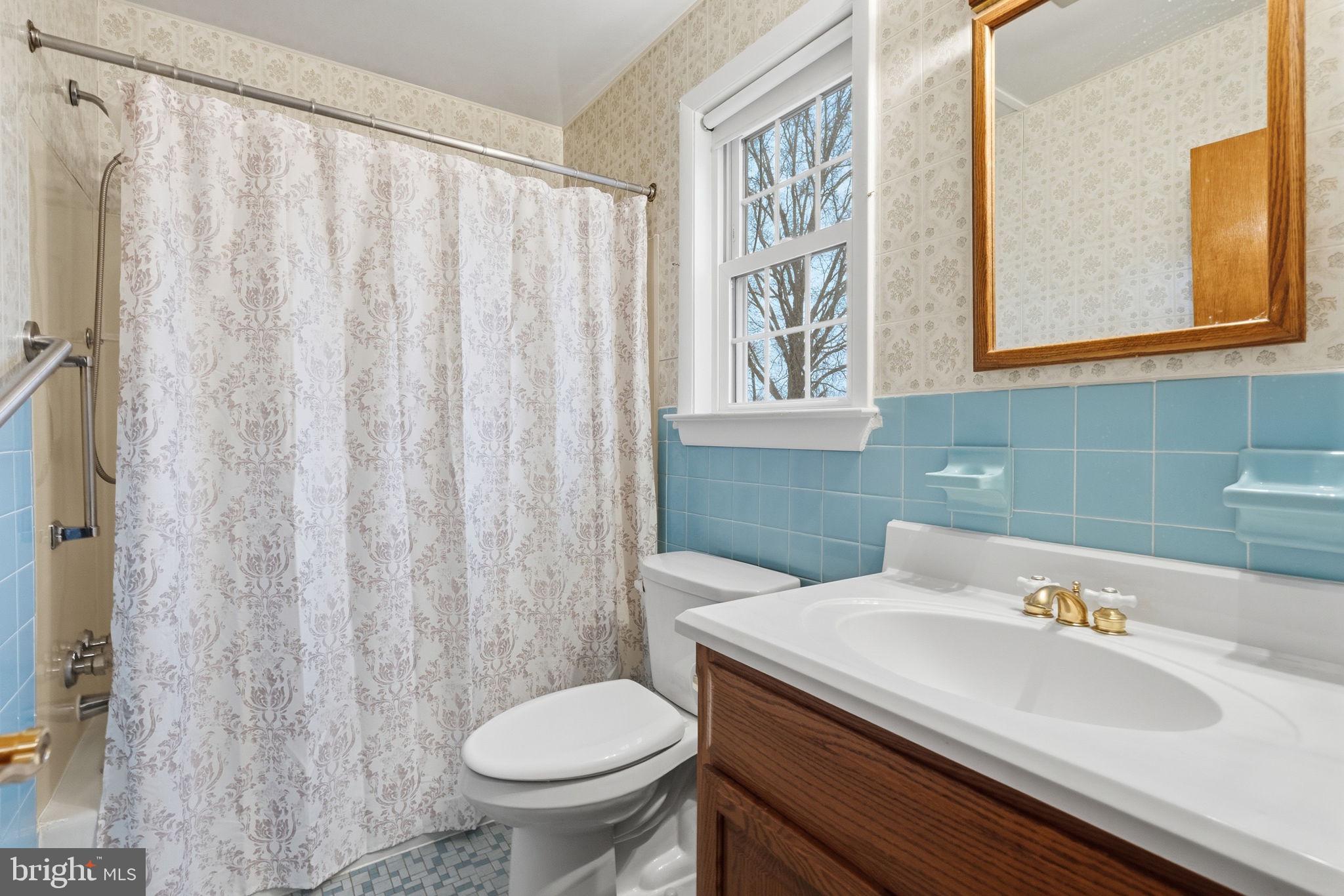 416 Oak Park Road Hatfield, PA 19440 - Photo 25 of 39 a bathroom with a sink a toilet and a window
