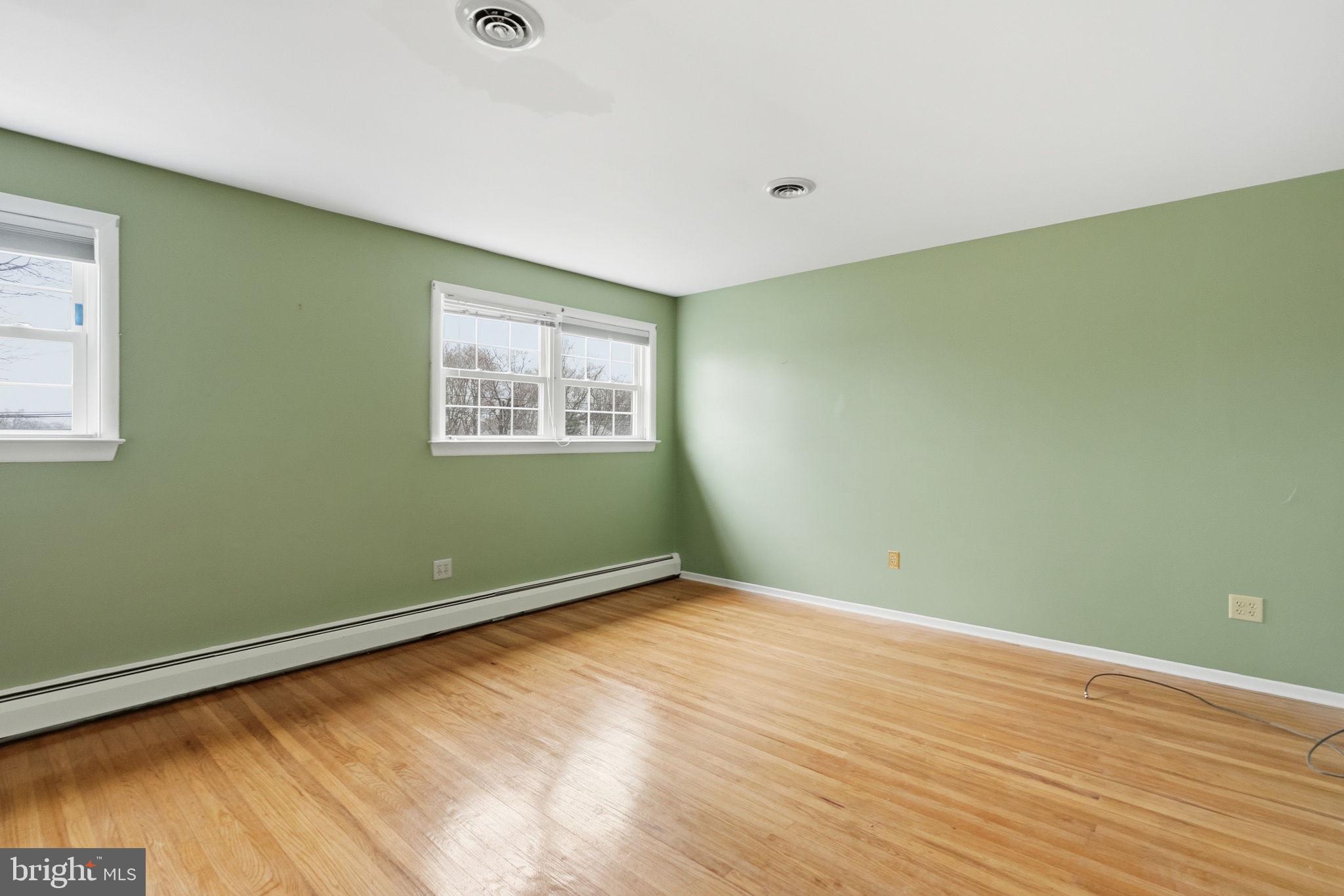 416 Oak Park Road Hatfield, PA 19440 - Photo 27 of 39 a view of a room with wooden floor and window