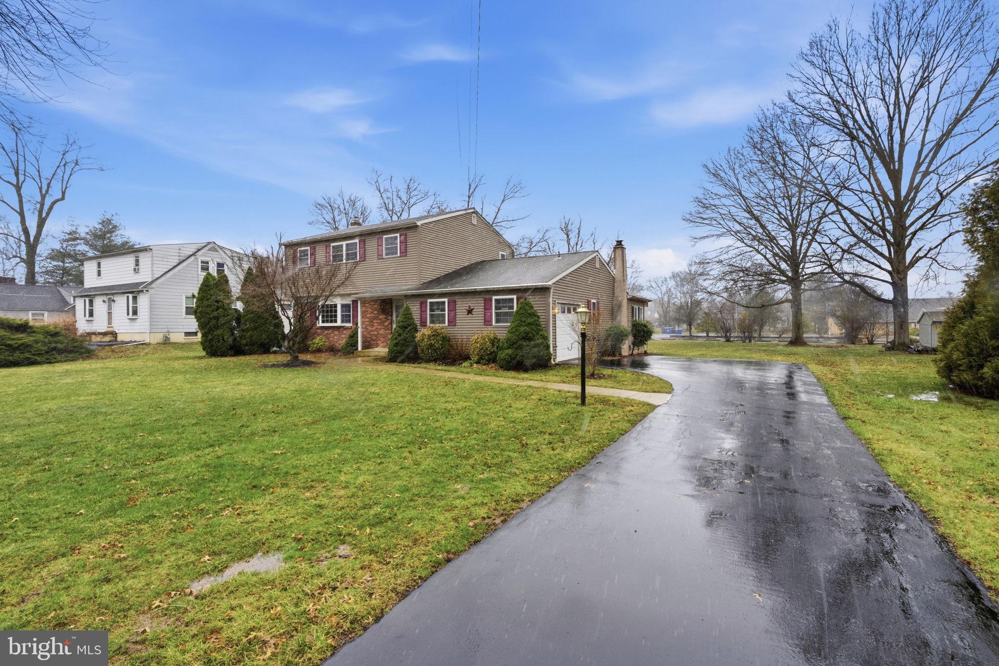 416 Oak Park Road Hatfield, PA 19440 - Photo 3 of 39 a view of a house with a yard