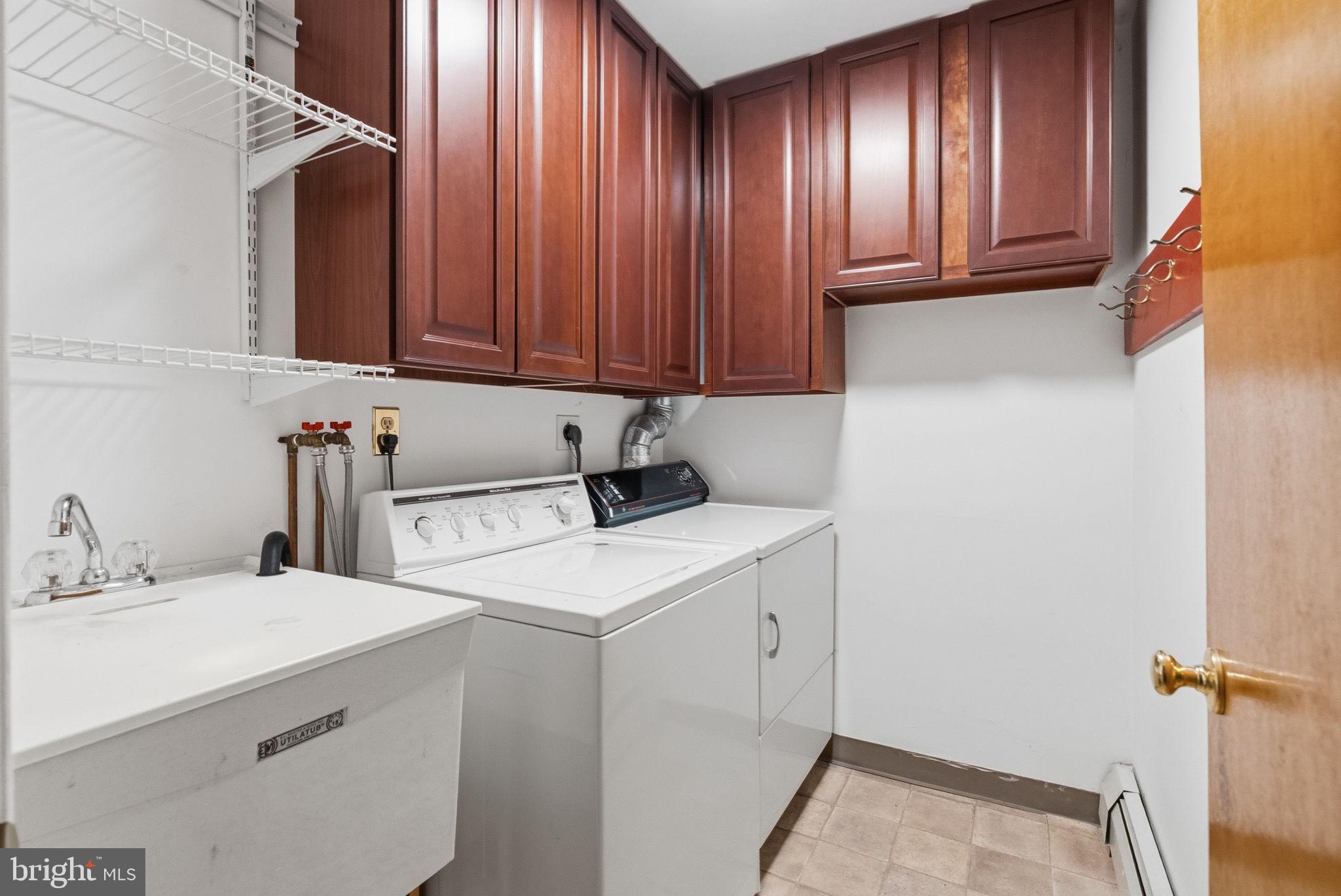 416 Oak Park Road Hatfield, PA 19440 - Photo 34 of 39 a utility room with a sink washer and dryer