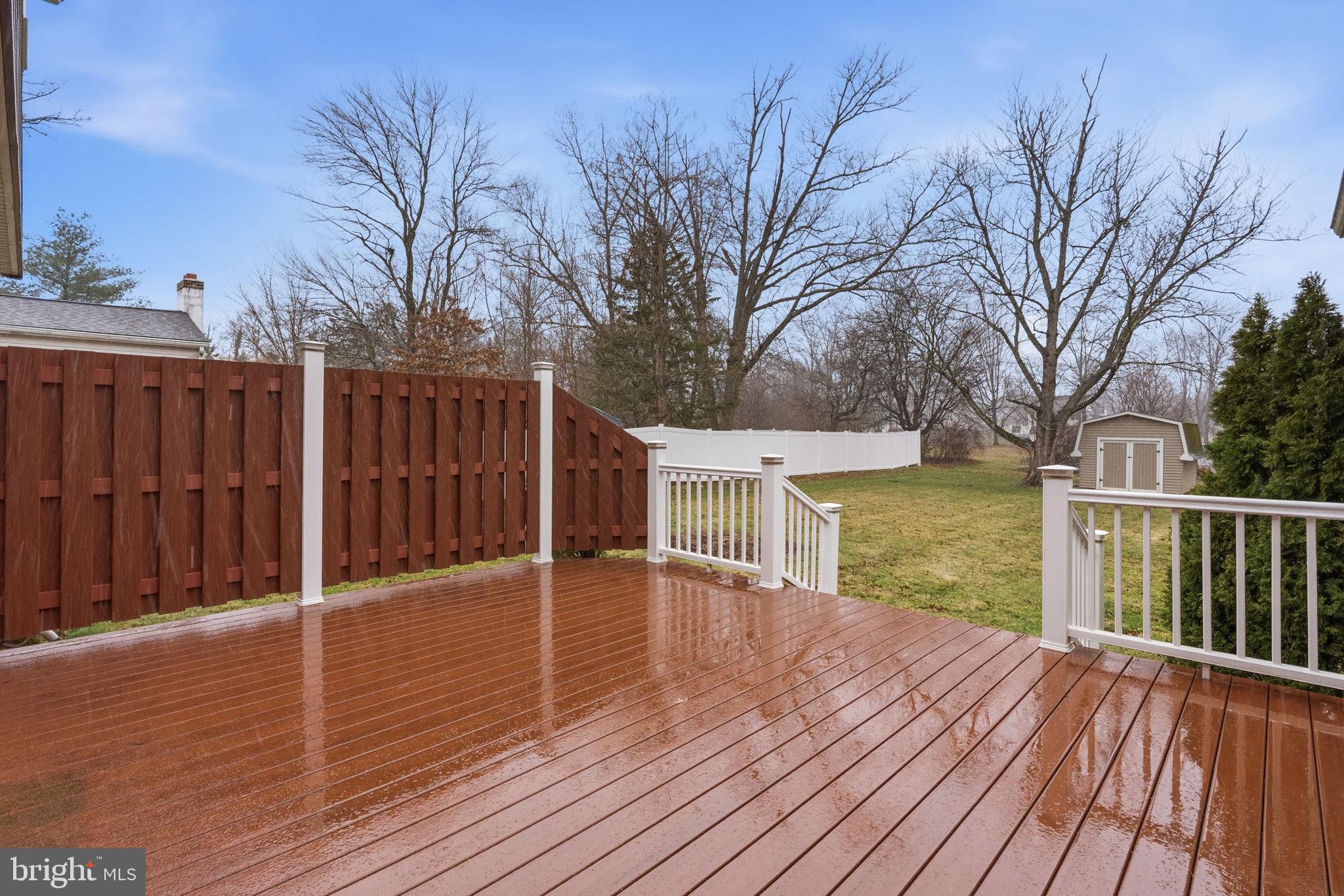 416 Oak Park Road Hatfield, PA 19440 - Photo 38 of 39 a view of a house with wooden floor next to a yard