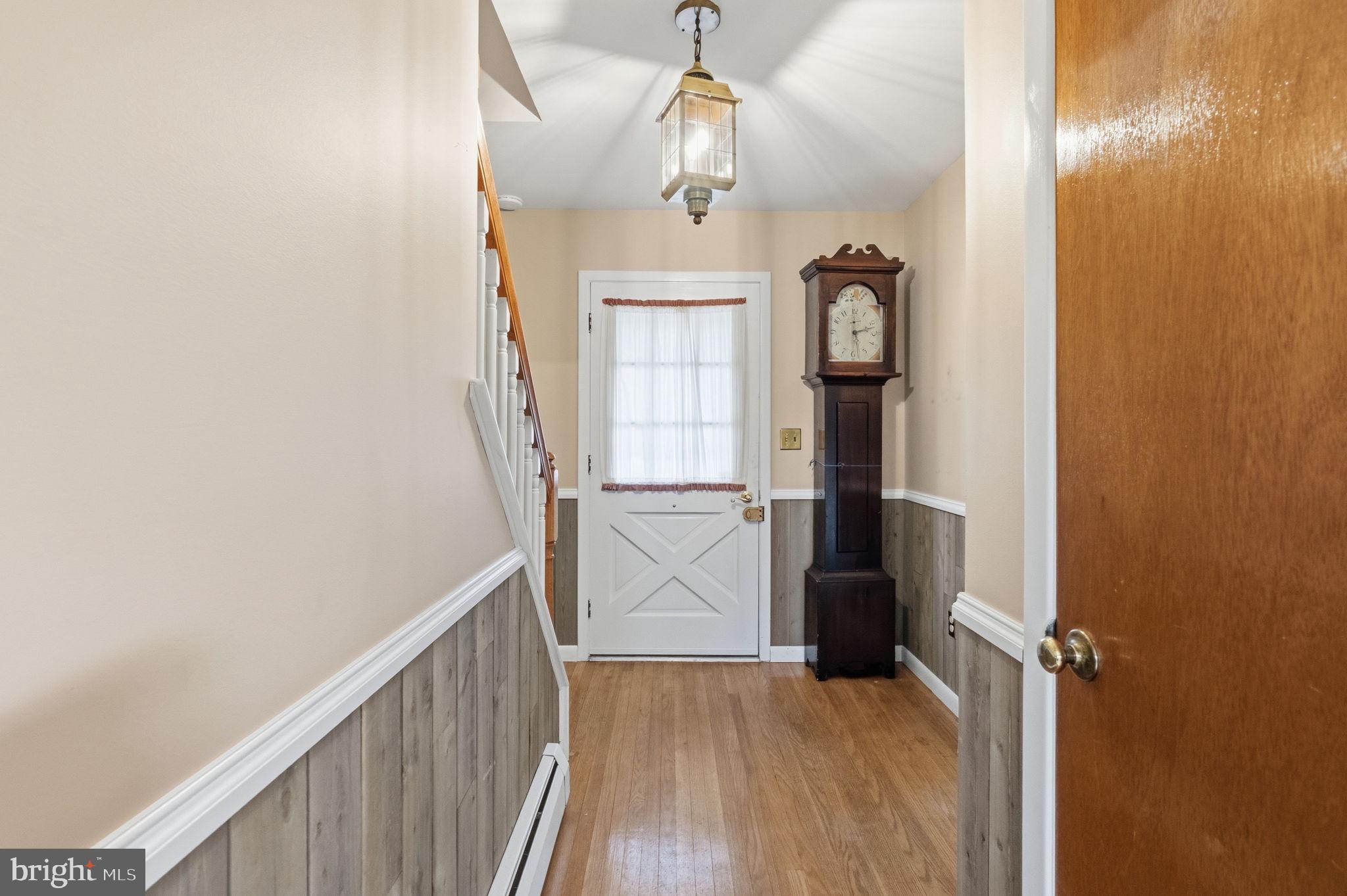 416 Oak Park Road Hatfield, PA 19440 - Photo 5 of 39 a view of entryway with wooden floor