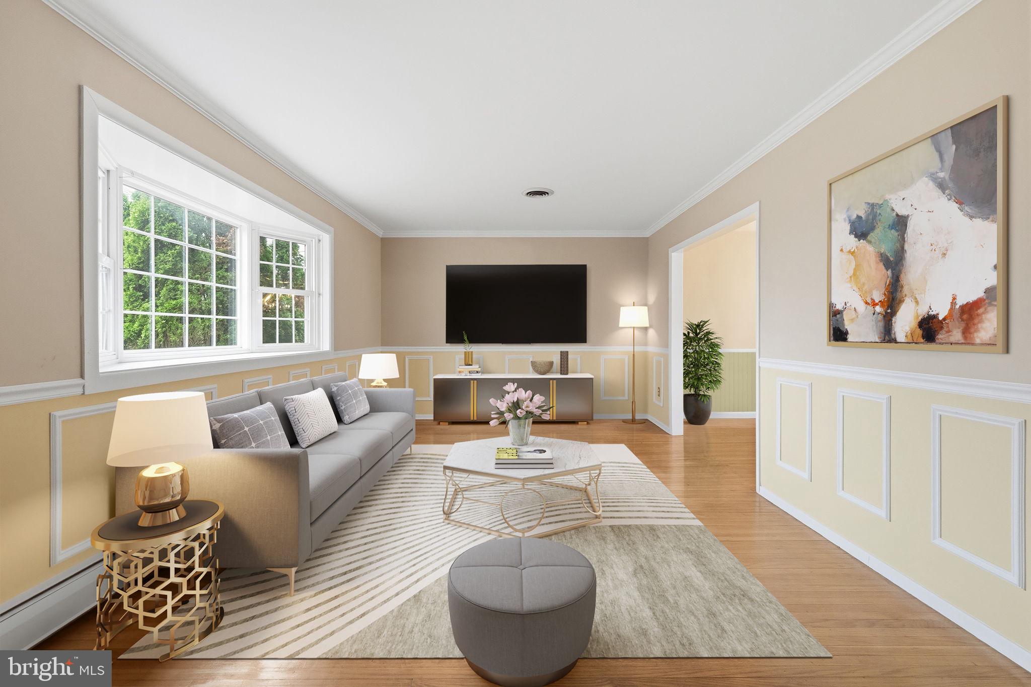 416 Oak Park Road Hatfield, PA 19440 - Photo 8 of 39 a living room with furniture and a flat screen tv