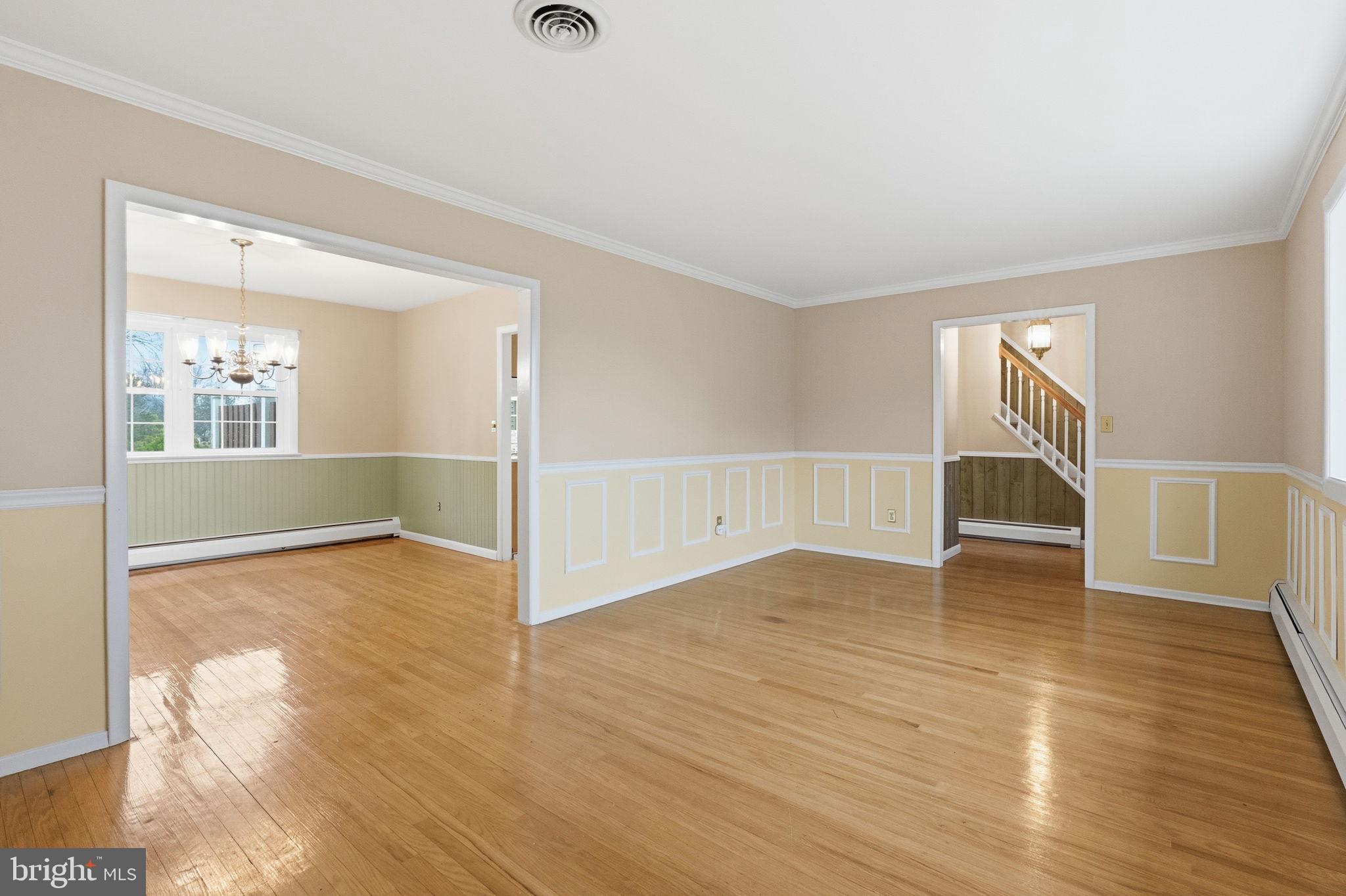 416 Oak Park Road Hatfield, PA 19440 - Photo 10 of 39 an empty room with wooden floor and windows
