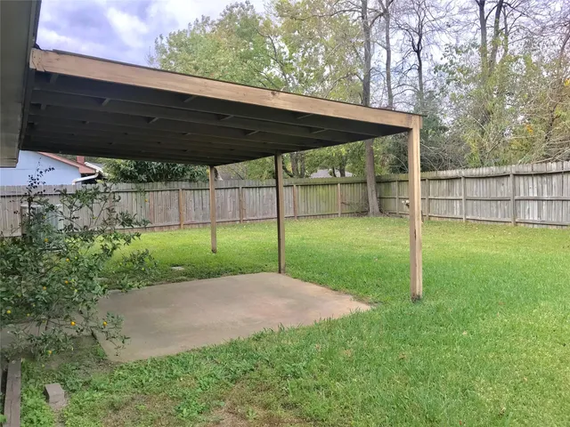 a view of a backyard with a garden