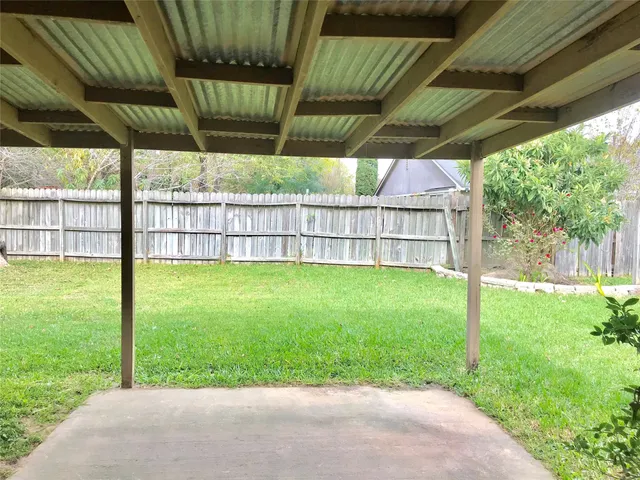 a view of a backyard with a garden