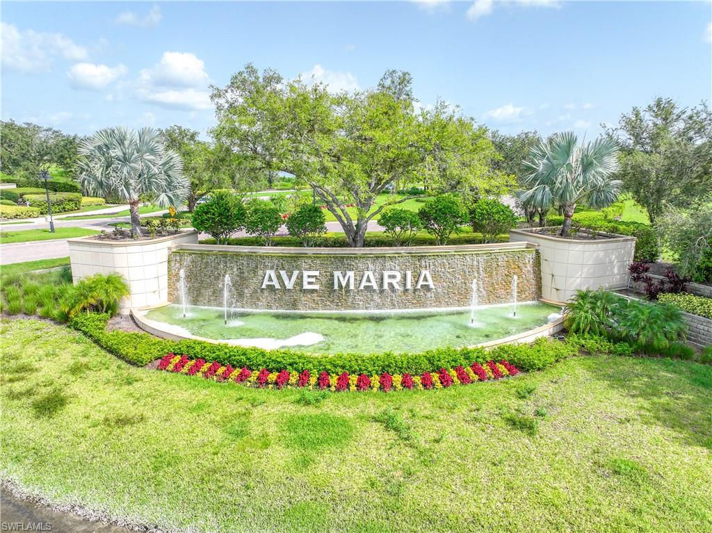 5375 Ferrari Avenue Ave Maria, FL 34142 - Photo 2 of 45 a view of swimming pool with a garden and plants