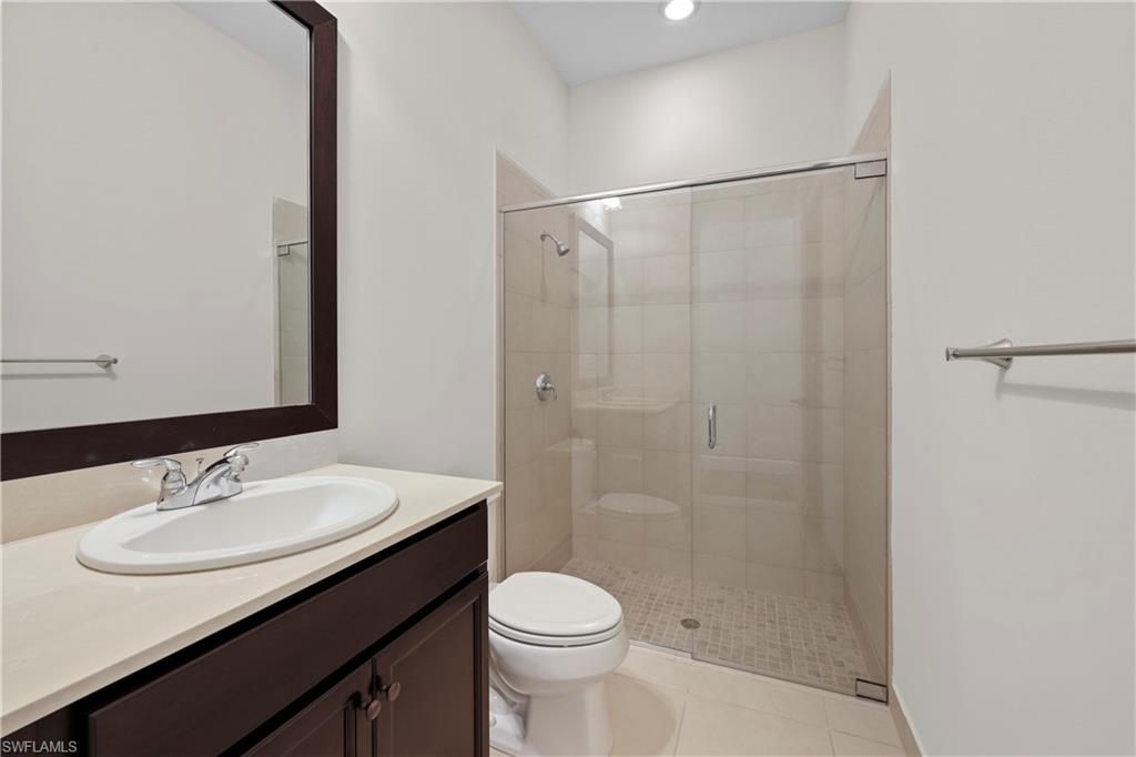 5375 Ferrari Avenue Ave Maria, FL 34142 - Photo 30 of 45 a bathroom with a sink toilet and shower