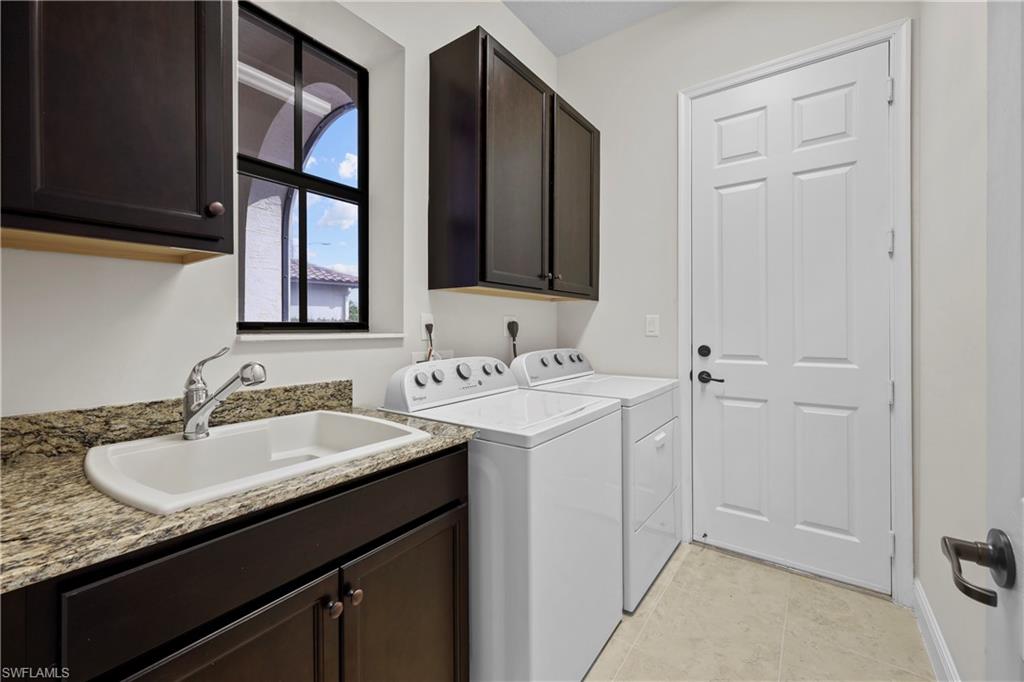 5375 Ferrari Avenue Ave Maria, FL 34142 - Photo 38 of 45 a bathroom with a sink and a mirror