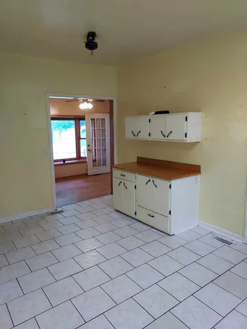 a view of a window in an empty room