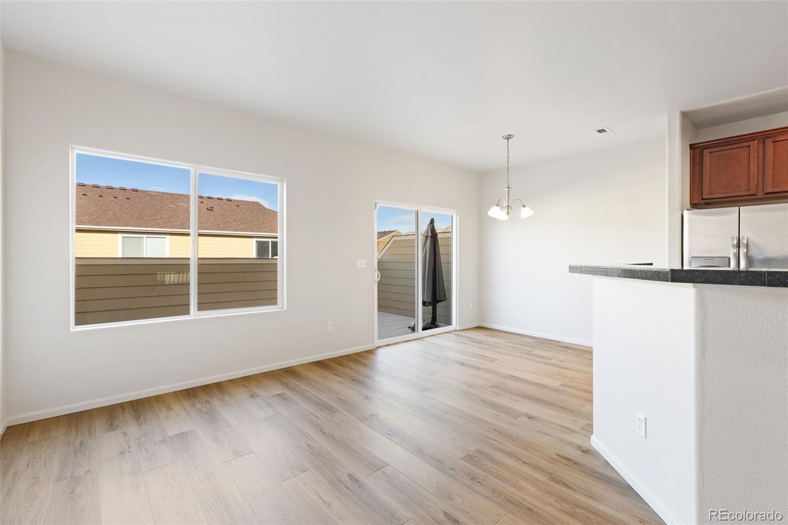 5645 Saint Patrick View Colorado Springs, CO 80923 - Photo 14 of 33 a view of an empty room with a window