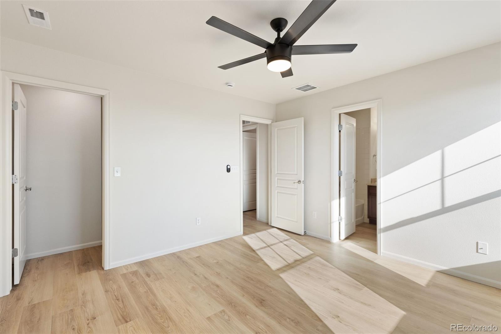 5645 Saint Patrick View Colorado Springs, CO 80923 - Photo 25 of 33 wooden floor in an empty room