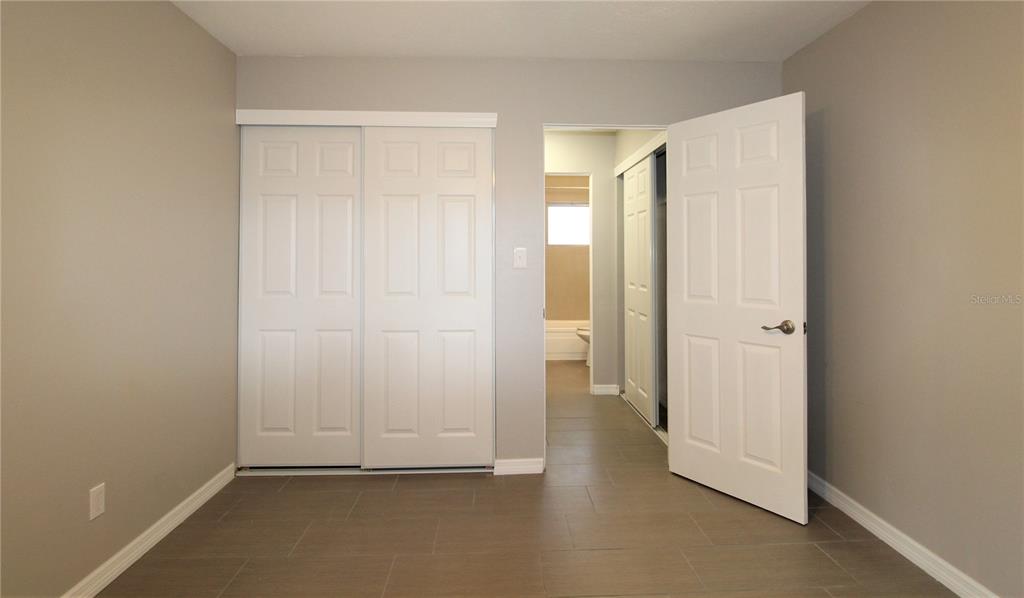 3001 Bee Ridge Road, Unit 111 Sarasota, FL 34239 - Photo 8 of 20 an empty room with a door