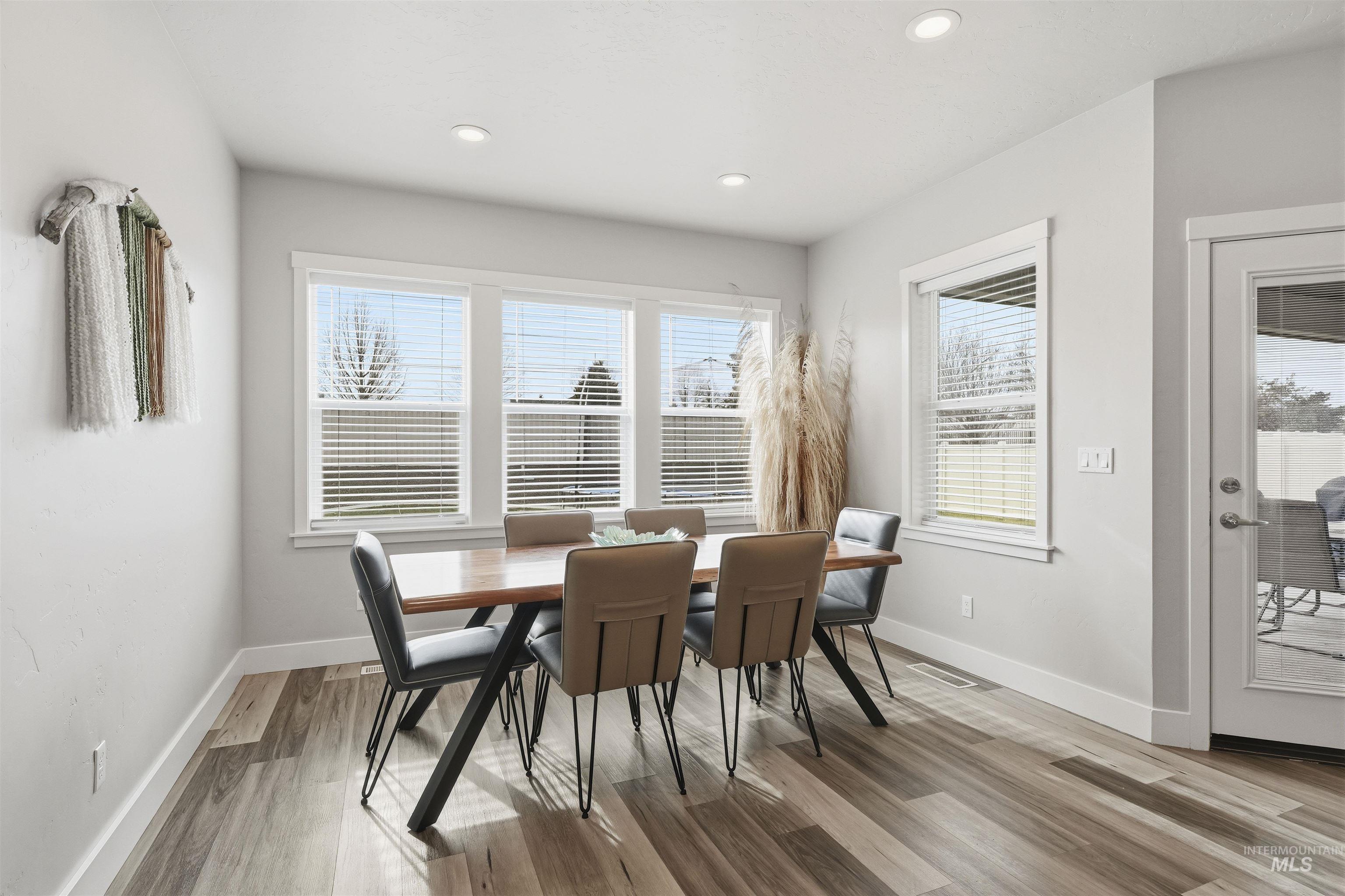 2229 East Grayson Street Meridian, ID 83642 - Photo 14 of 40 Dining room with light wood-style flooring and recessed lighting