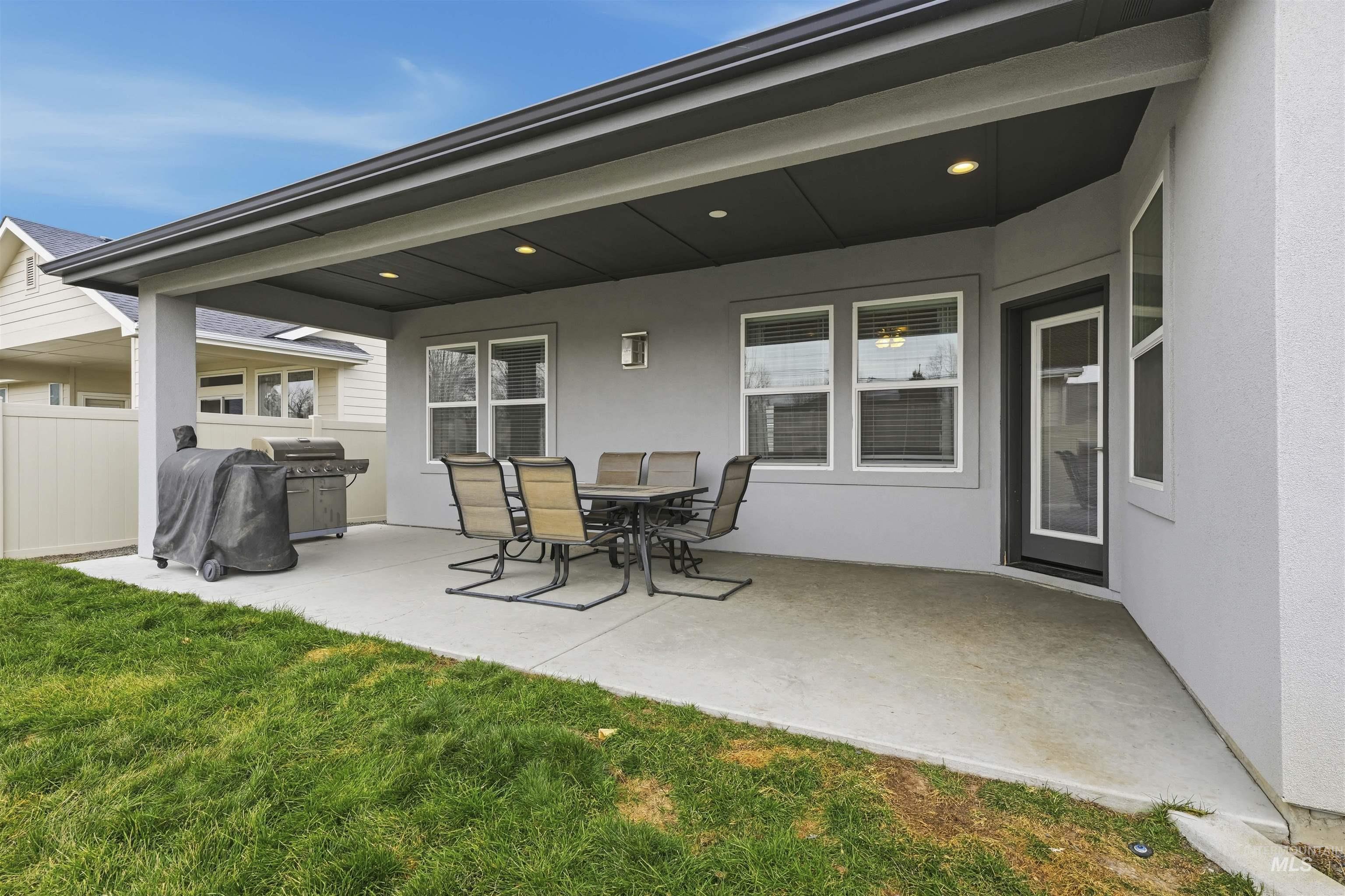 2229 East Grayson Street Meridian, ID 83642 - Photo 35 of 40 View of patio featuring outdoor dining space and grilling area