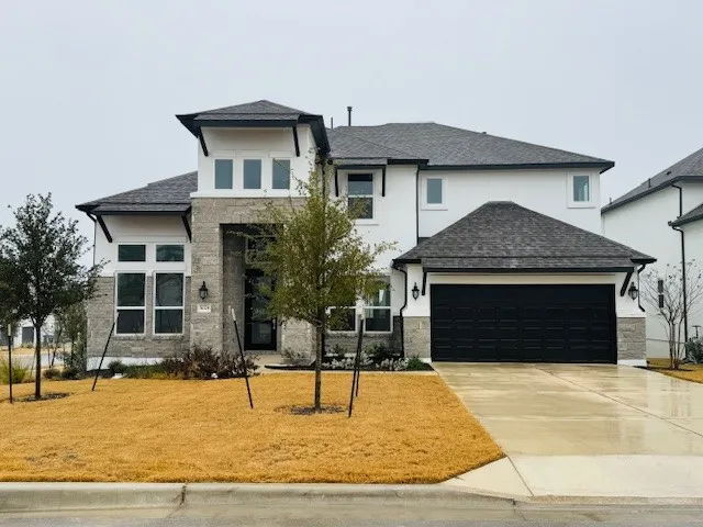 a house view with a outdoor seating