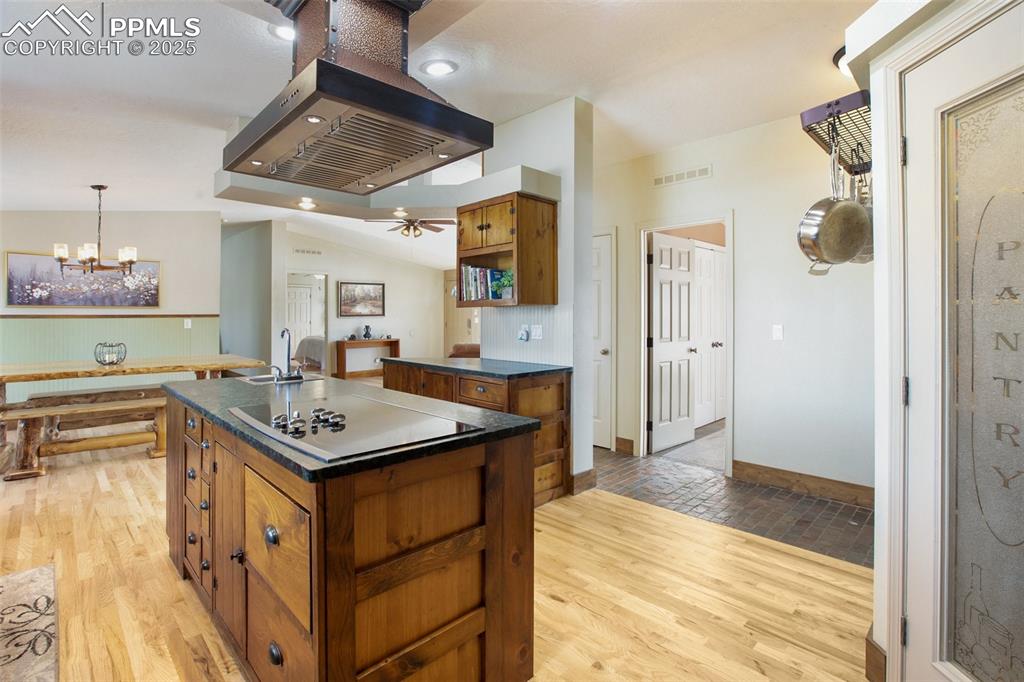 63 Bear Claw Trail Divide, CO 80814 - Photo 10 of 28 a bathroom with a sink a toilet a mirror and shower