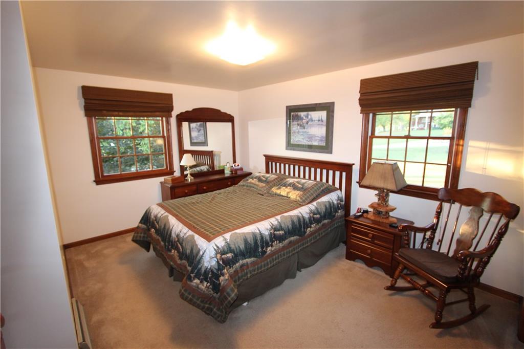 274 Ruffsdale Road Ruffs Dale, PA 15679 - Photo 36 of 48 a bedroom with a bed chair and two windows