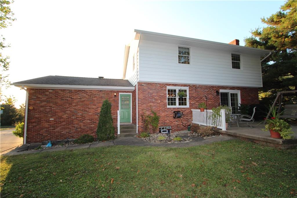 274 Ruffsdale Road Ruffs Dale, PA 15679 - Photo 8 of 48 a view of a house with a yard and sitting area
