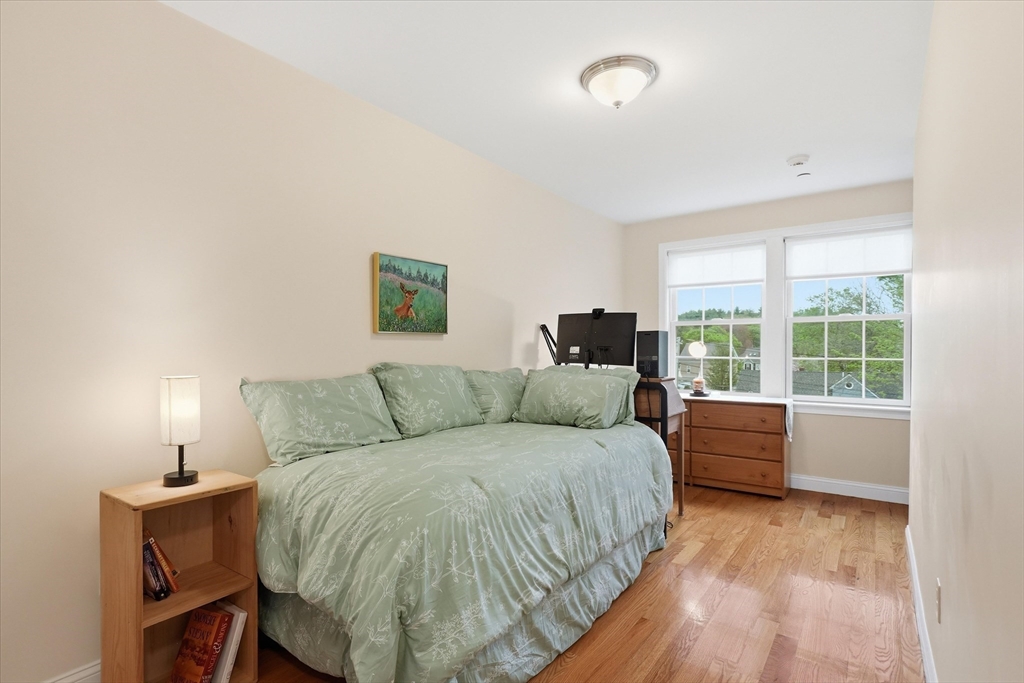 2 B Gates Lane, Unit B Wakefield, MA 01880 - Photo 20 of 42 a living room with a bed furniture and a window