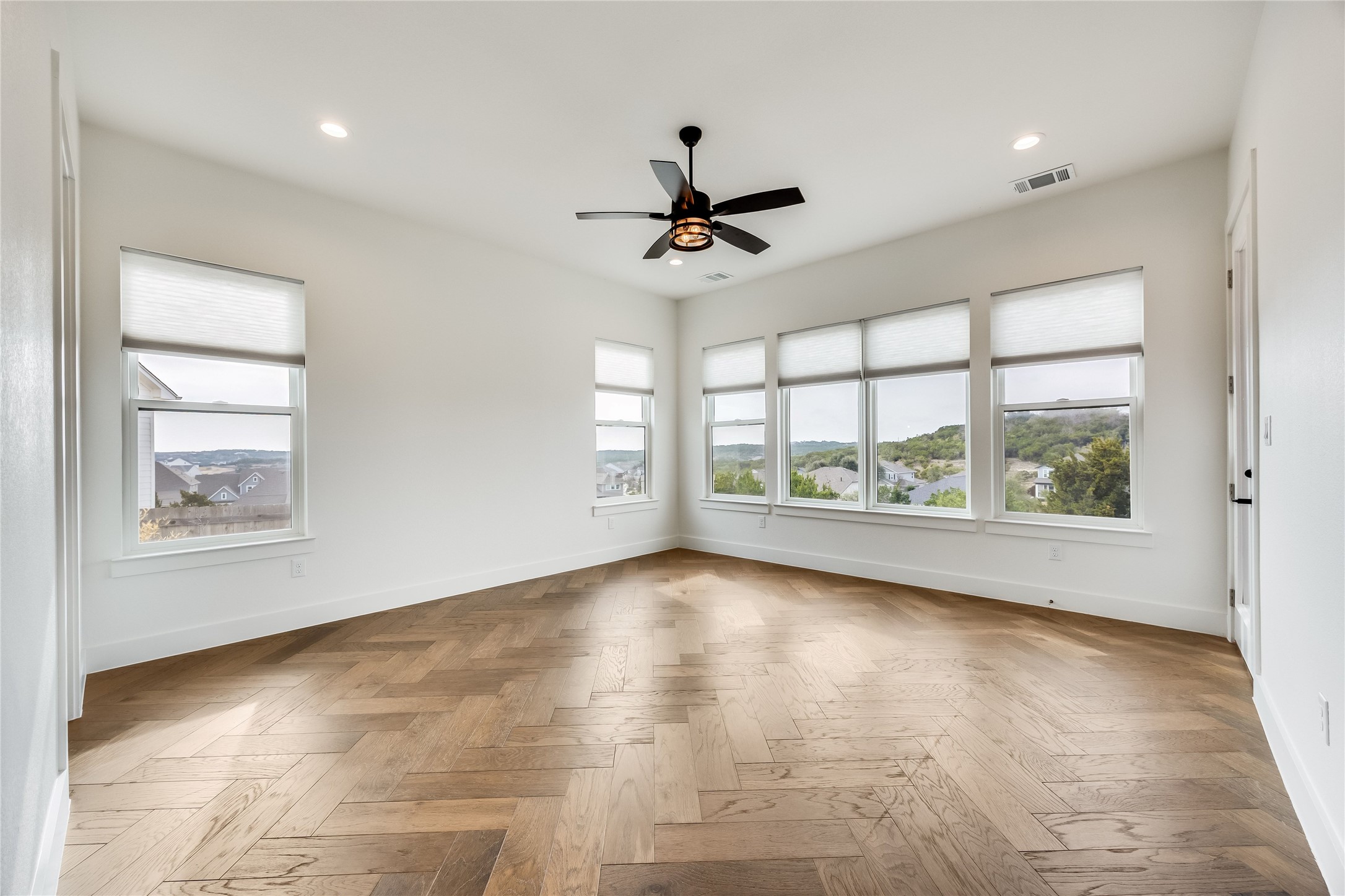 288 Smoke Tree Circle Dripping Springs, TX 78620 - Photo 12 of 40 a view of an empty room with a window