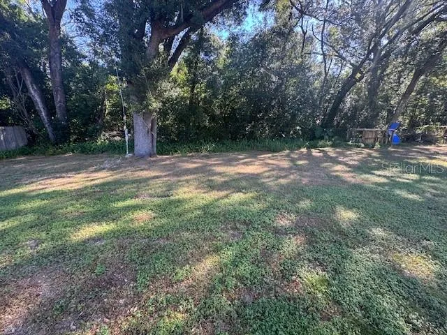 a view of road with trees