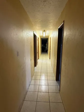 a view of a hallway from a hallway