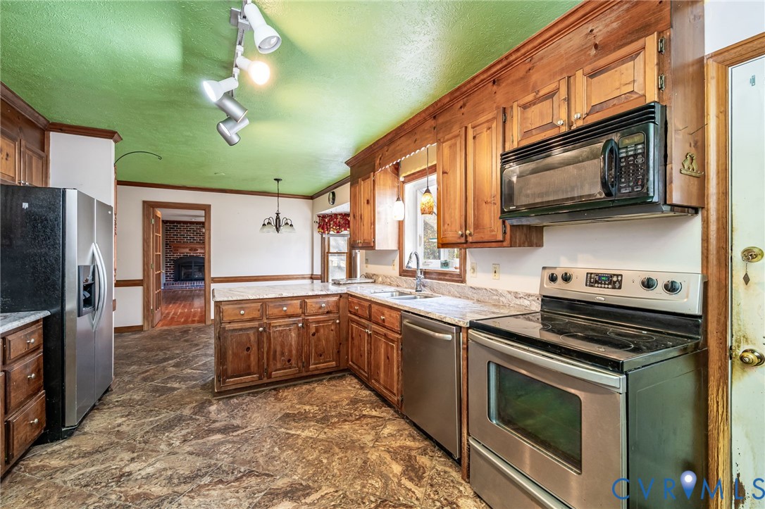8910 Tunstall Road New Kent, VA 23124 - Photo 11 of 45 Kitchen featuring appliances with stainless steel
