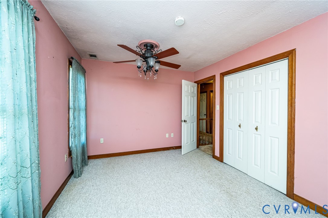 8910 Tunstall Road New Kent, VA 23124 - Photo 24 of 45 Unfurnished bedroom featuring carpet flooring, a c