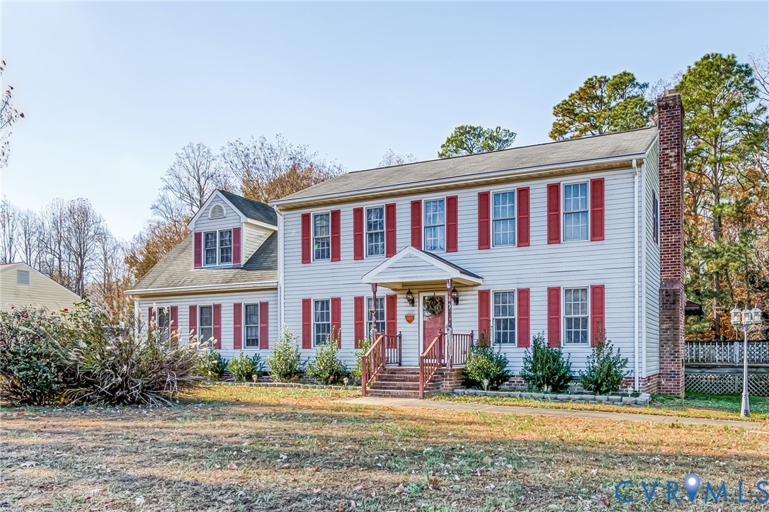 8910 Tunstall Road New Kent, VA 23124 - Photo 3 of 45 Colonial inspired home with a chimney and a front