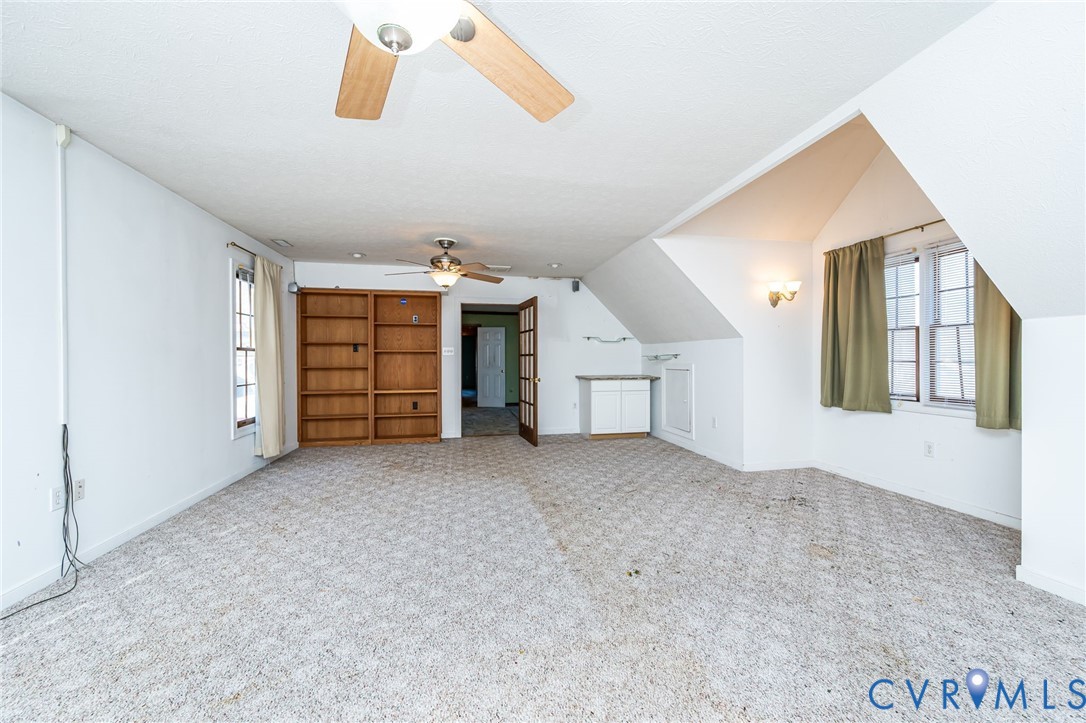 8910 Tunstall Road New Kent, VA 23124 - Photo 31 of 45 Bonus room featuring healthy amount of natural lig