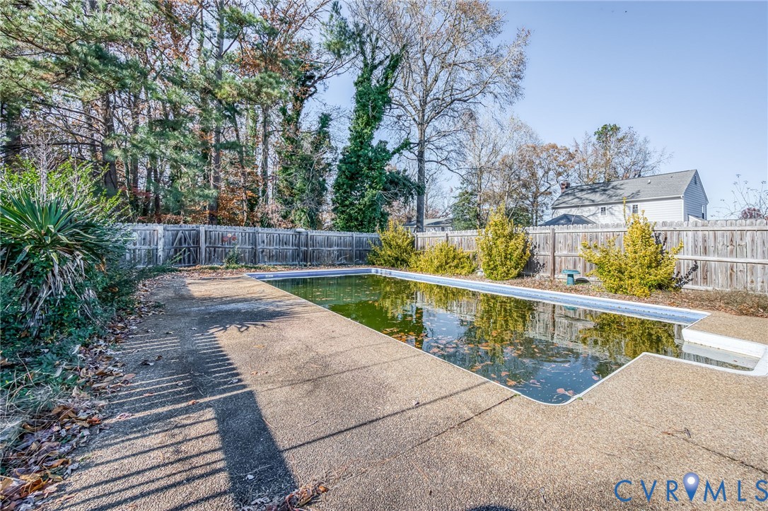 8910 Tunstall Road New Kent, VA 23124 - Photo 40 of 45 View of pool with a fenced backyard