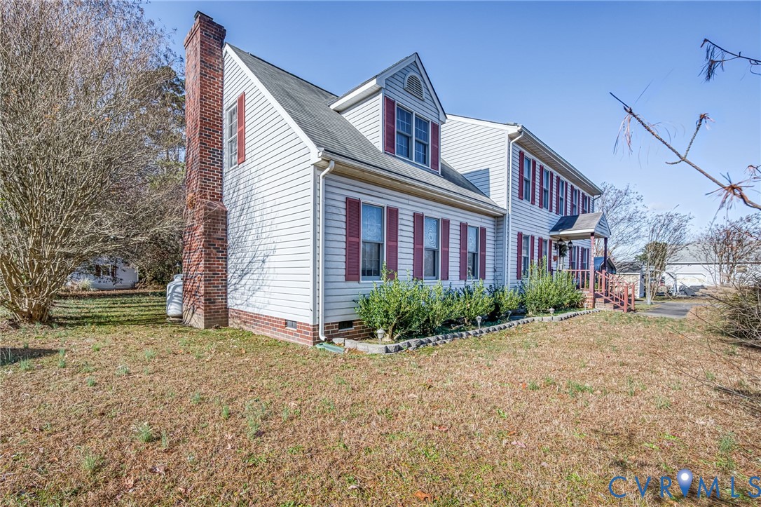 8910 Tunstall Road New Kent, VA 23124 - Photo 4 of 45 View of front of home with a front lawn, crawl spa