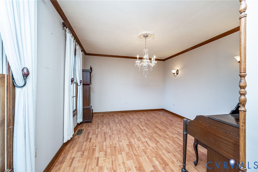 8910 Tunstall Road New Kent, VA 23124 - Photo 8 of 45 Unfurnished dining area featuring light wood-type