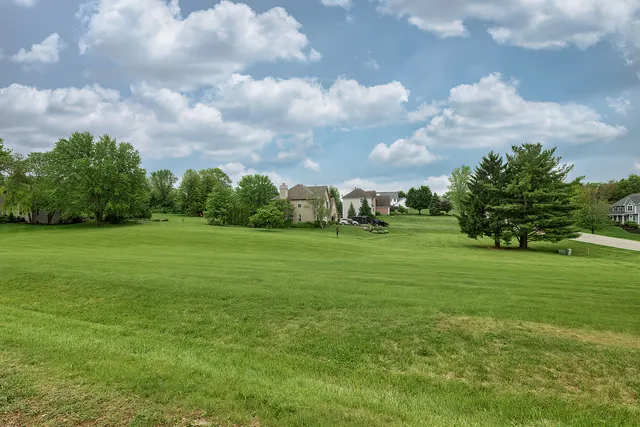 a view of a garden with houses