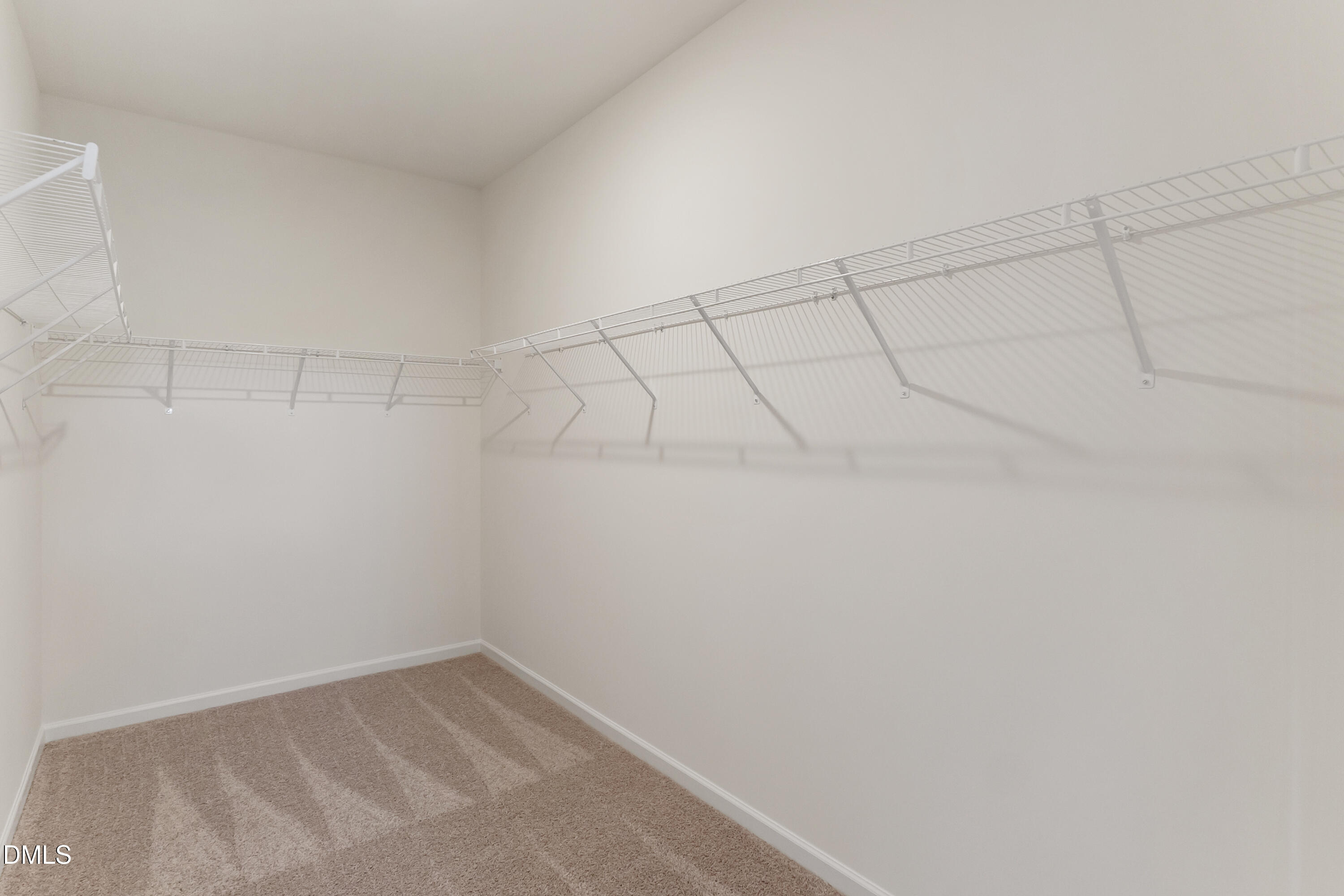 173 Courtside Drive Dunn, NC 28334 - Photo 15 of 24 a view of a room with racks on the wall