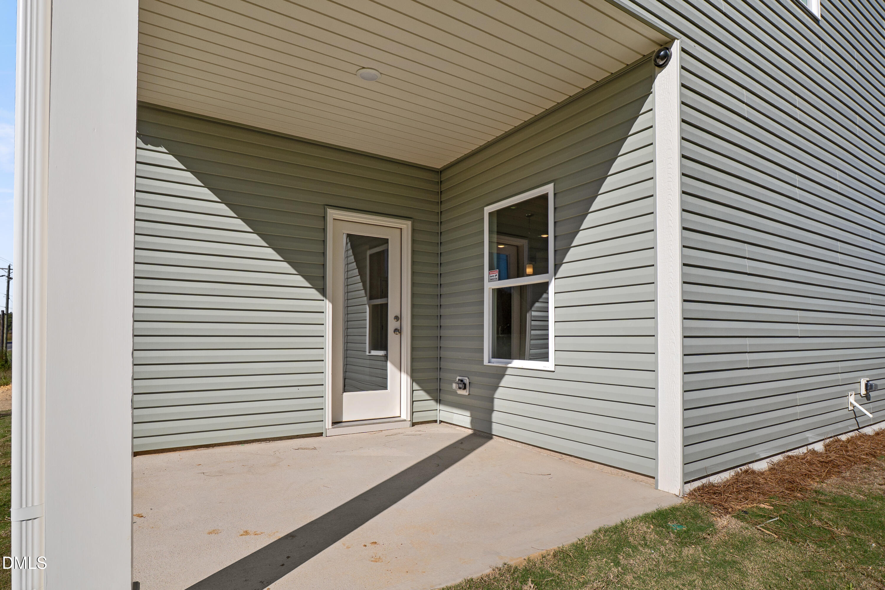173 Courtside Drive Dunn, NC 28334 - Photo 21 of 24 a view of a porch with a door