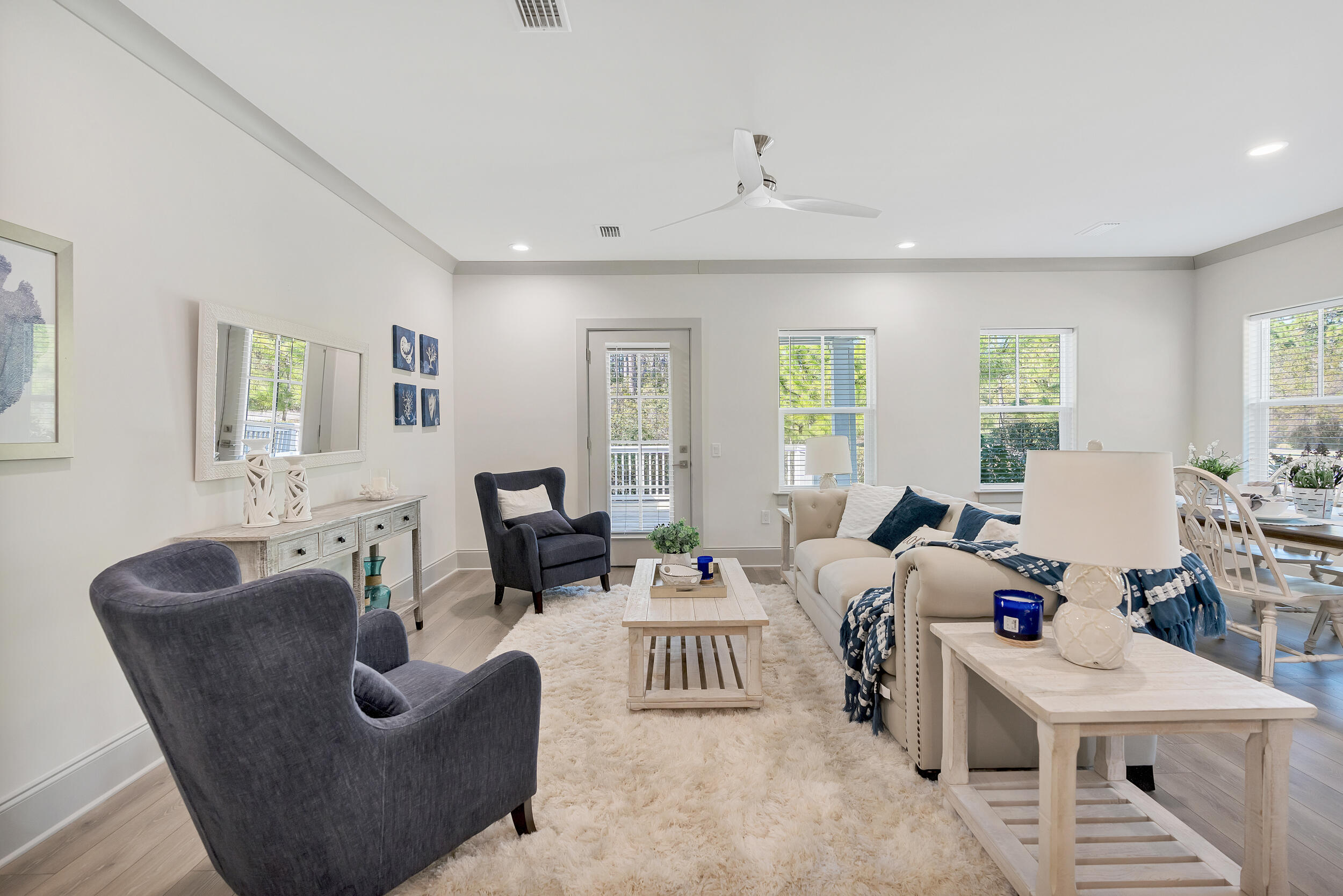 35 Golden Bell Ct Inlet Beach, Unit 35A Inlet Beach, FL 32461 - Photo 21 of 47 a living room with furniture and a large window