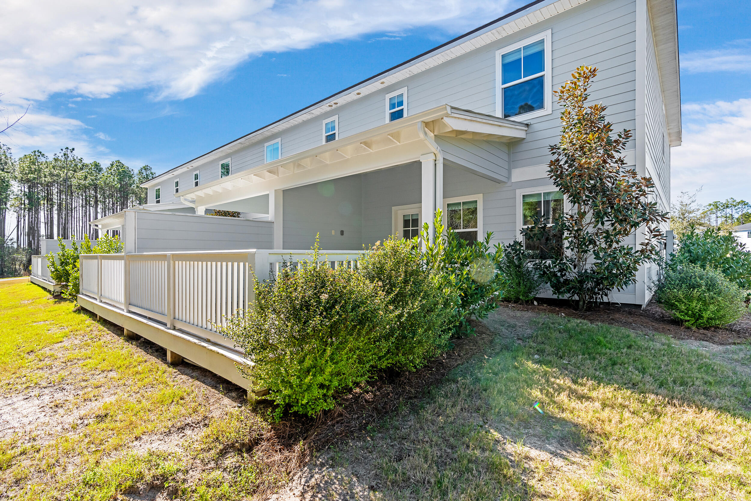 35 Golden Bell Ct Inlet Beach, Unit 35A Inlet Beach, FL 32461 - Photo 3 of 47 a view of a house with a backyard